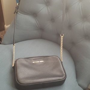 Michael Kors small over the shoulder bag.